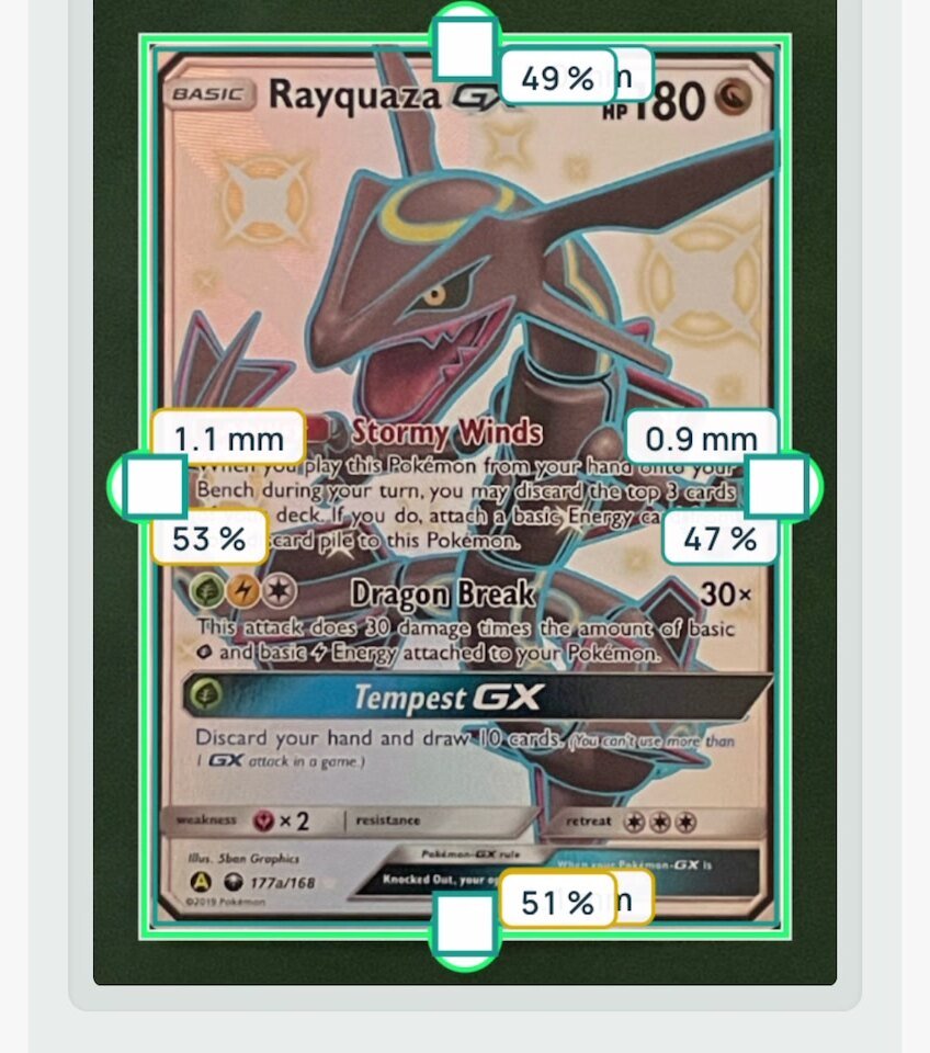 Rayquaza GX card on the table measured in Kartometro: green edge rectangle, blue frame rectangle and mm dimensions